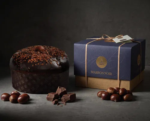 Panettone de castañas y chocolate gianduia de Fiasconaro junto a su envoltorio