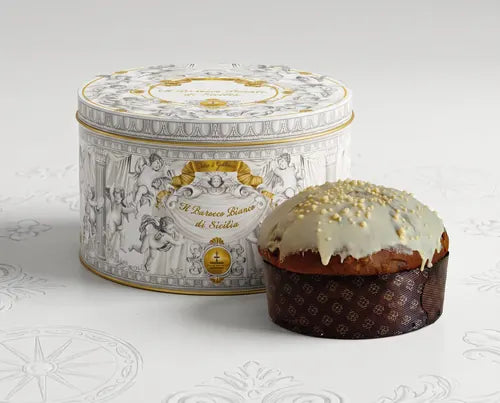 Panettone Barocco Bianco di Sicilia Fiasconaro Dolce & Gabbana con su lata blanca