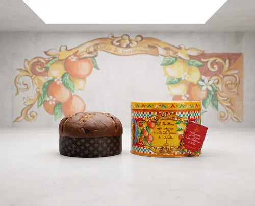 Panettone de cítricos y azafrán Fiasconaro Dolce & Gabbana con su lata de naranjas y limones